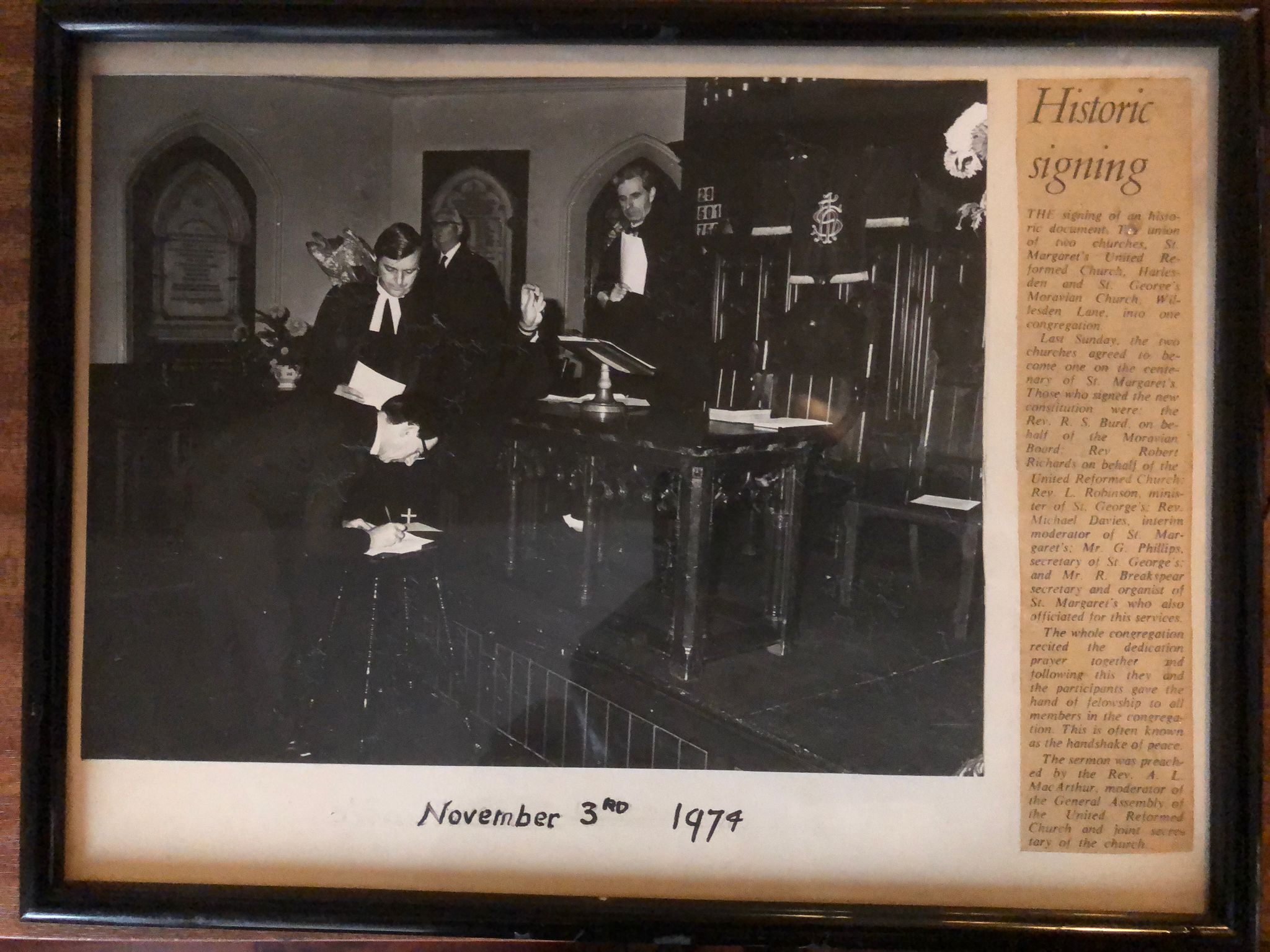 Historic signing of two churches, St. Margaret's United Reformed Church< Harlesden and St. George's Moravian Chursh, Willesden Lane, into one congregation on November 3rd, 1974..